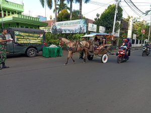 Berbagi Keberkahan di Bulan Ramadhan, Koramil 05/KJ Bagikan Makanan Siap Saji Ke Pengguna Jalan dan Masyarakat