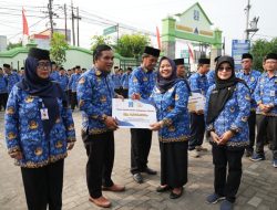 Peringati Hari OTDA dan Hari Kartini, Bupati Kustini Serahkan Tali Asih Bagi Anggota KORPRI Gamping
